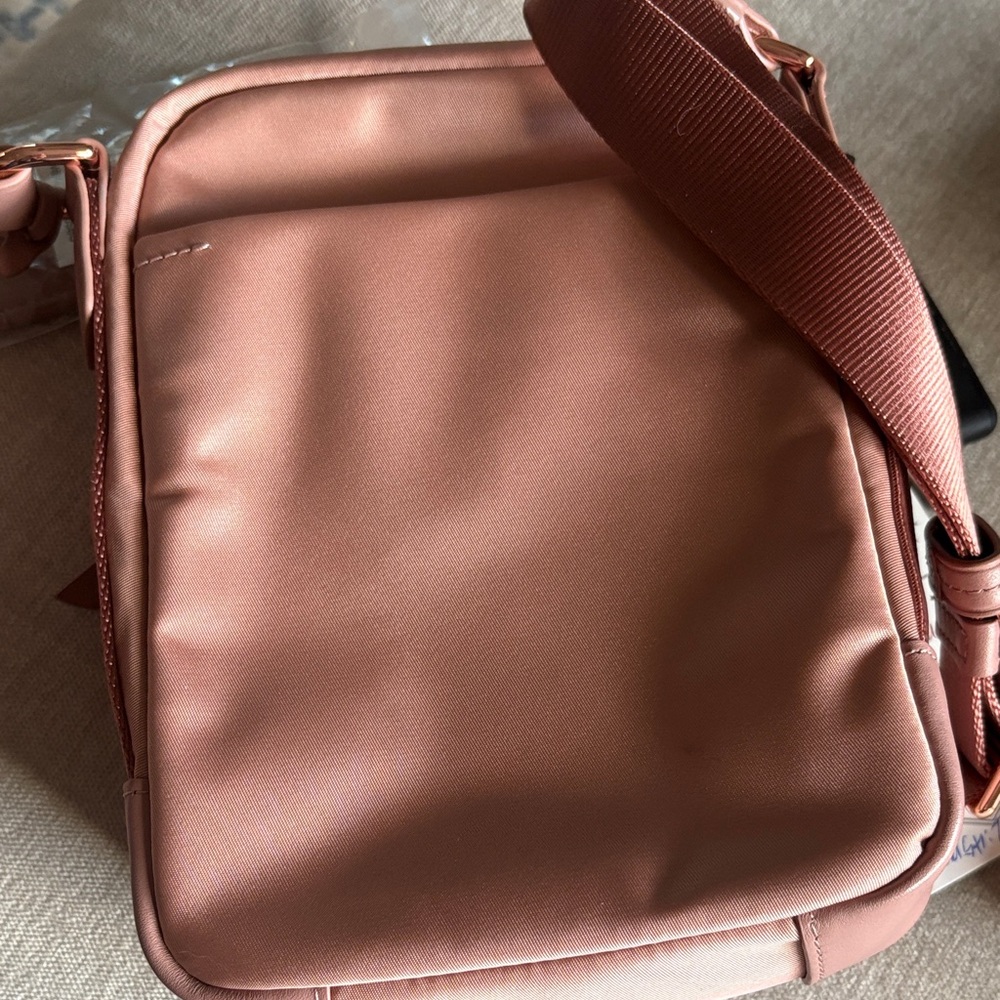 Tumi Crossbody Bag in rose gold Pink with rose gold hardware. - Picture 5 of 6